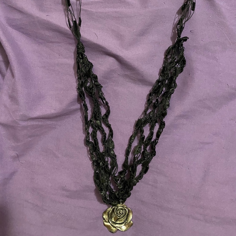 Unique mean rose pendant necklace